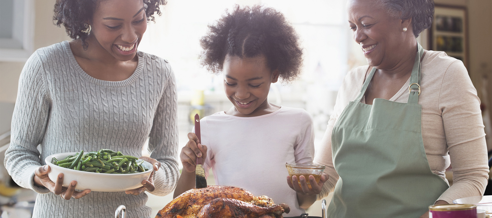 Family cooking thanksgiving dinner together image