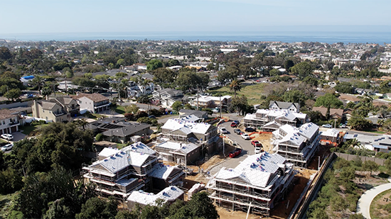 Drone image shot above 5 Highland Residences in March 2024